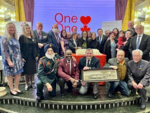 Cake cutting -what a proud moment! the Exclusion descendants, dignataries (Senator, MPs, Mayor etc) , Silver Cross Mothers and Veteran - OUR CANADA in the microcosm